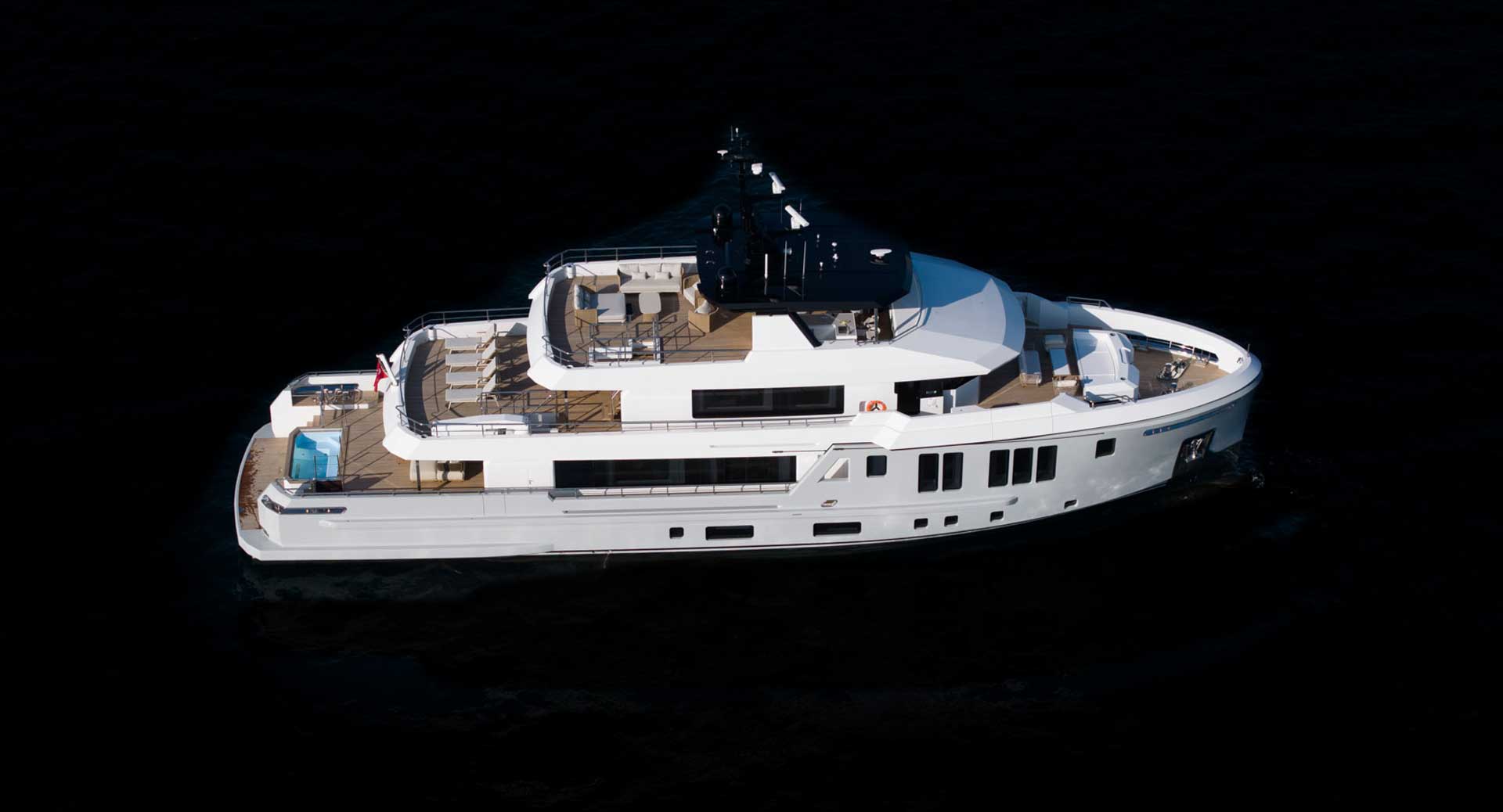 bee-yacht-img-tota-02l BEE YACHTS 35M EXPLORER yacht sailing on calm blue sea, side view showing sleek profile and multiple decks.